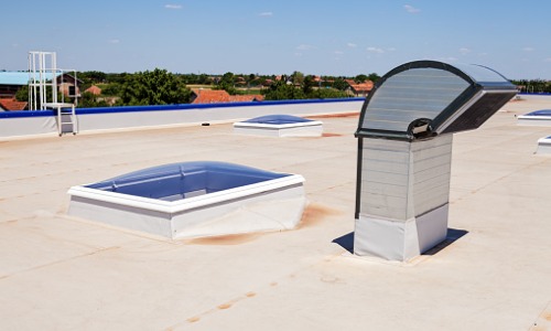 White Flat Roofs in Scottsdale AZ with skylights and ventilation 